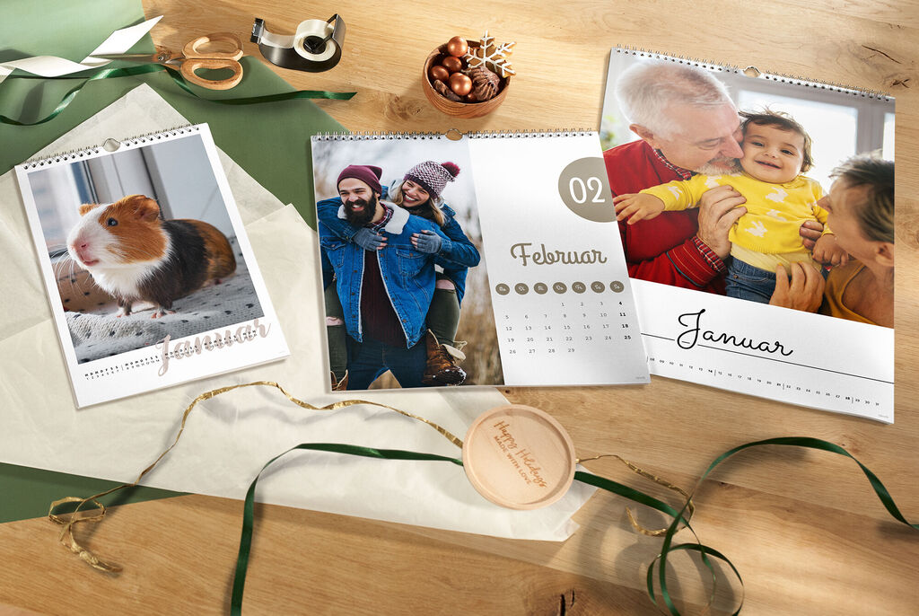 Calender pages featuring pets and family moments